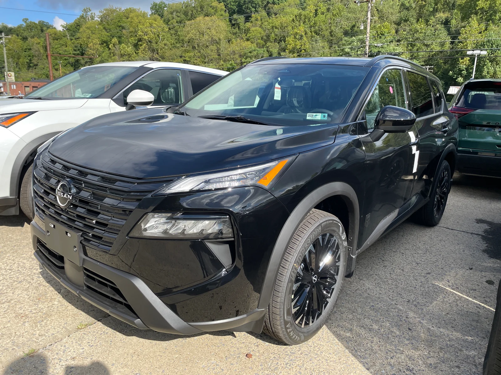 New 2026 Super Black Nissan Dark Armor™ image 1