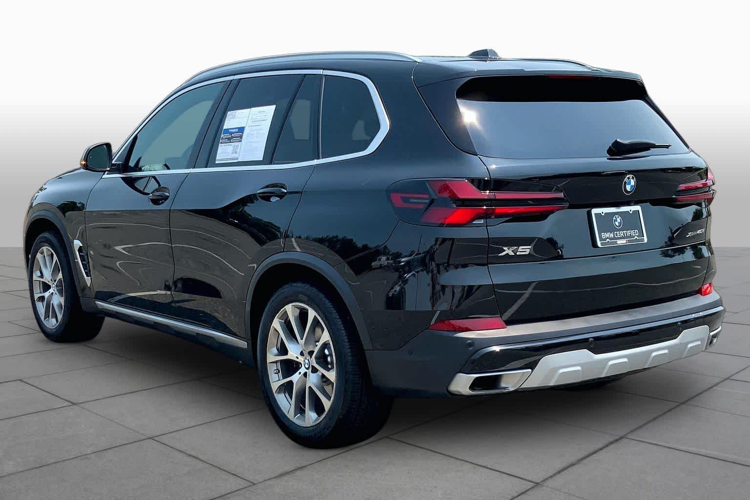 Certified Used 2024 Black Sapphire Metallic BMW xDrive40i image 11