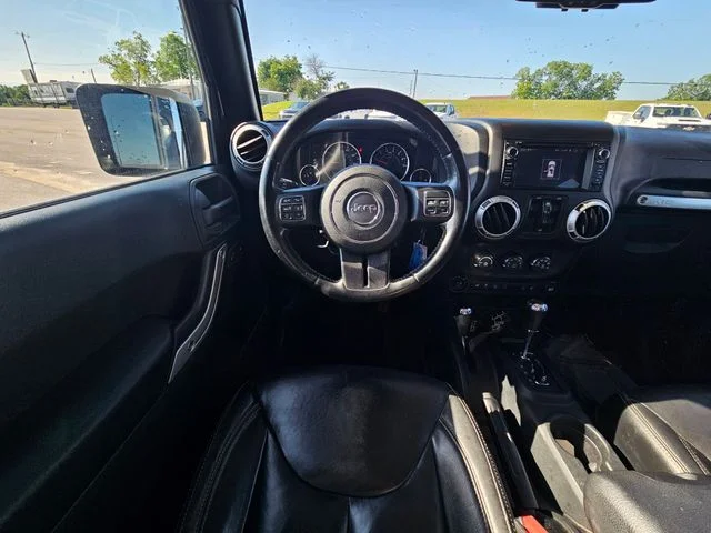 Used 2017 Black Jeep Unlimited Sahara image 13