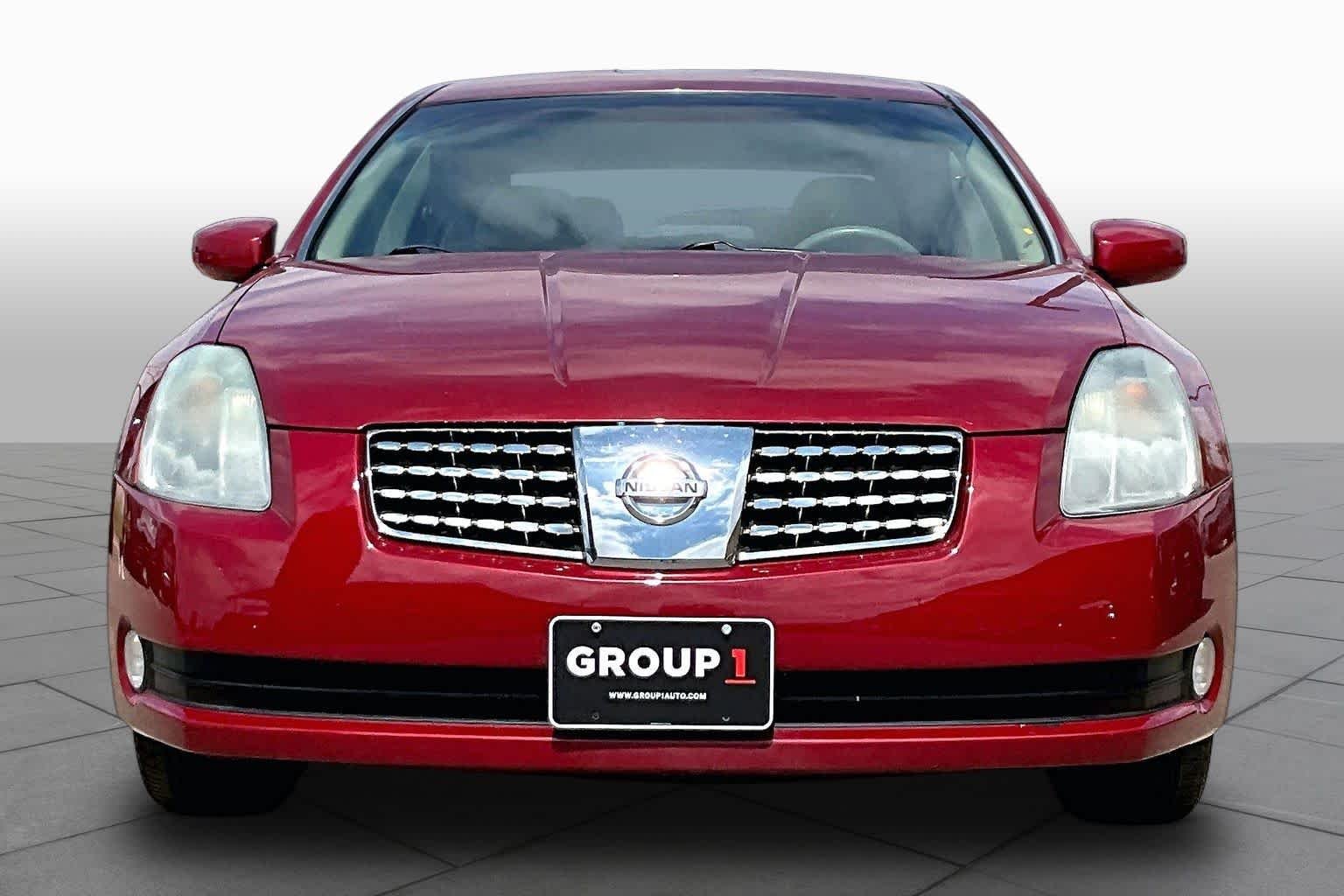 Used 2004 Red Opulence Metallic Nissan SE image 3