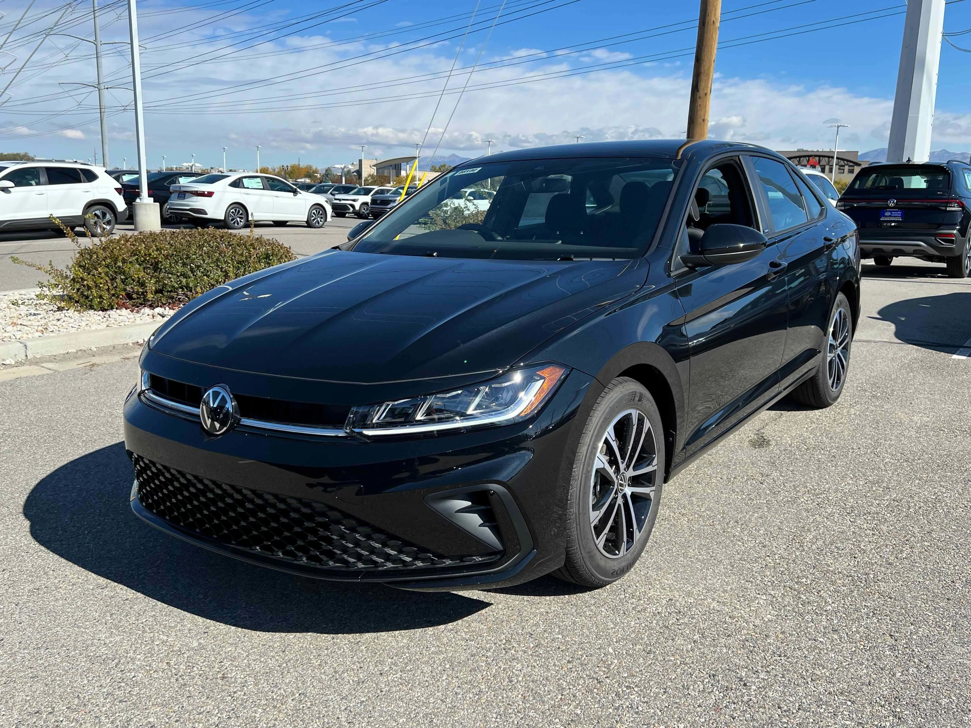 New 2026 Black Volkswagen Sport image 1