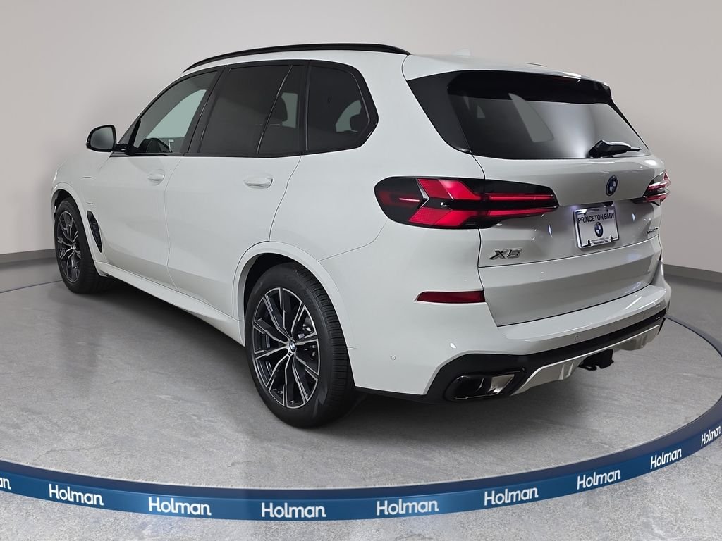 New 2026 Alpine White BMW xDrive50e image 7