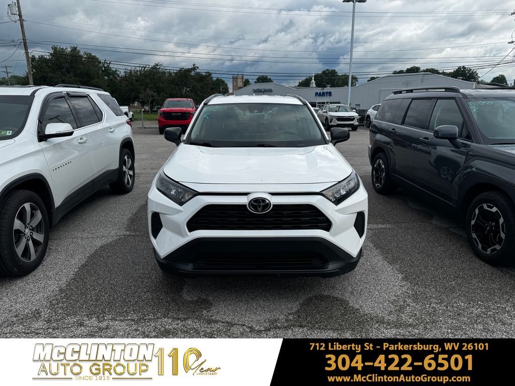 Used 2021 White Toyota LE image 2