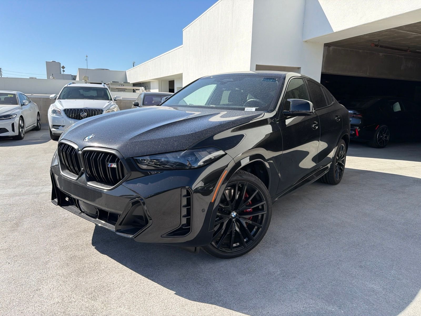 Used 2027 Black Sapphire Metallic BMW M60i image 3