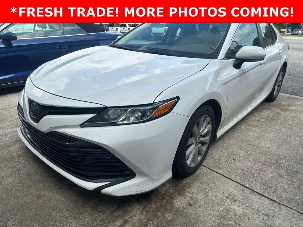 Used 2018 Super White Toyota LE image 1