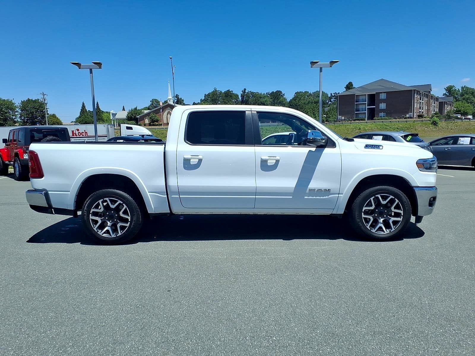 Used 2025 Bright White Clearcoat Ram Laramie Crew Cab 4x4 5