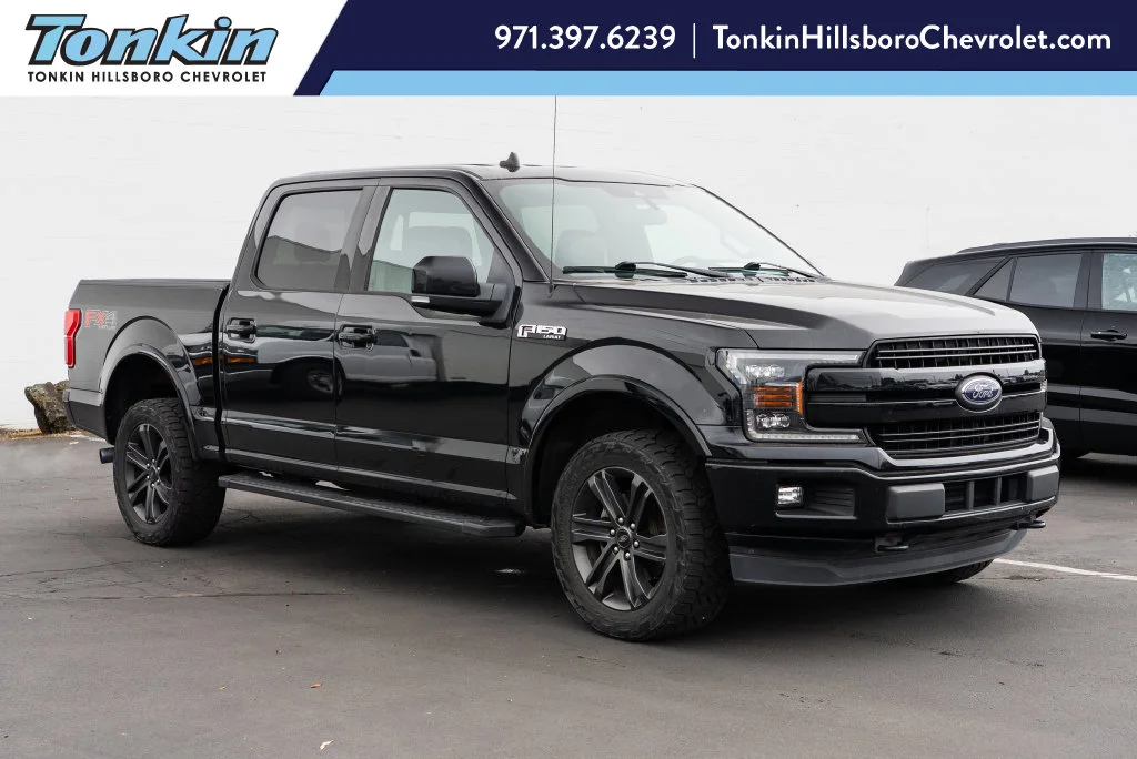 Used 2020 Black Metallic Ford Lariat image 1