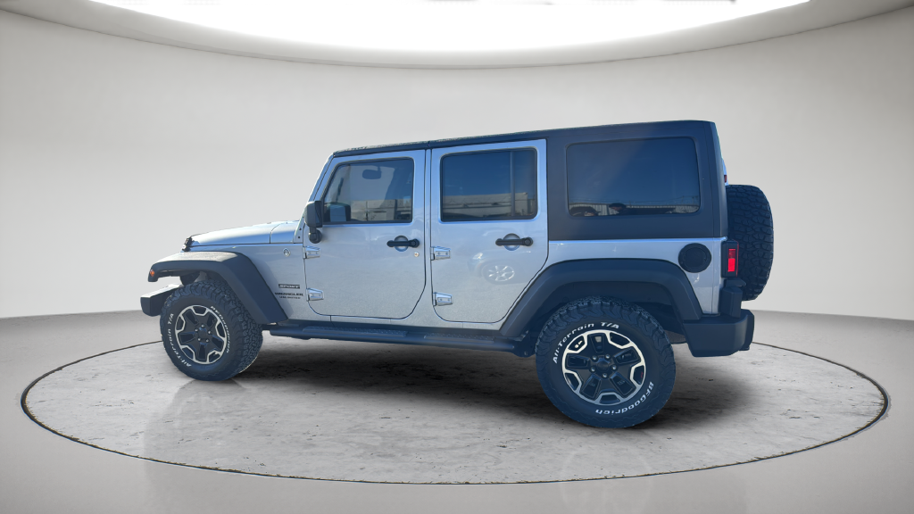 Used 2013 Silver Jeep Unlimited Sport image 13