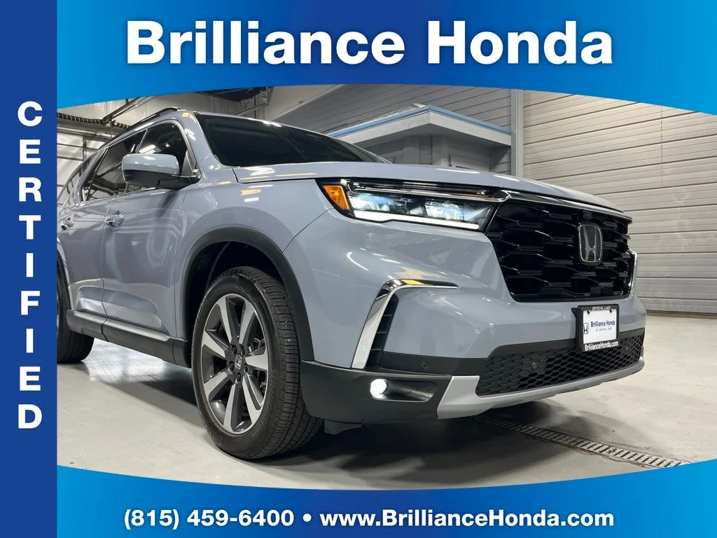 Certified Used 2023 Sonic Gray Pearl Honda AWD ELITE image 1
