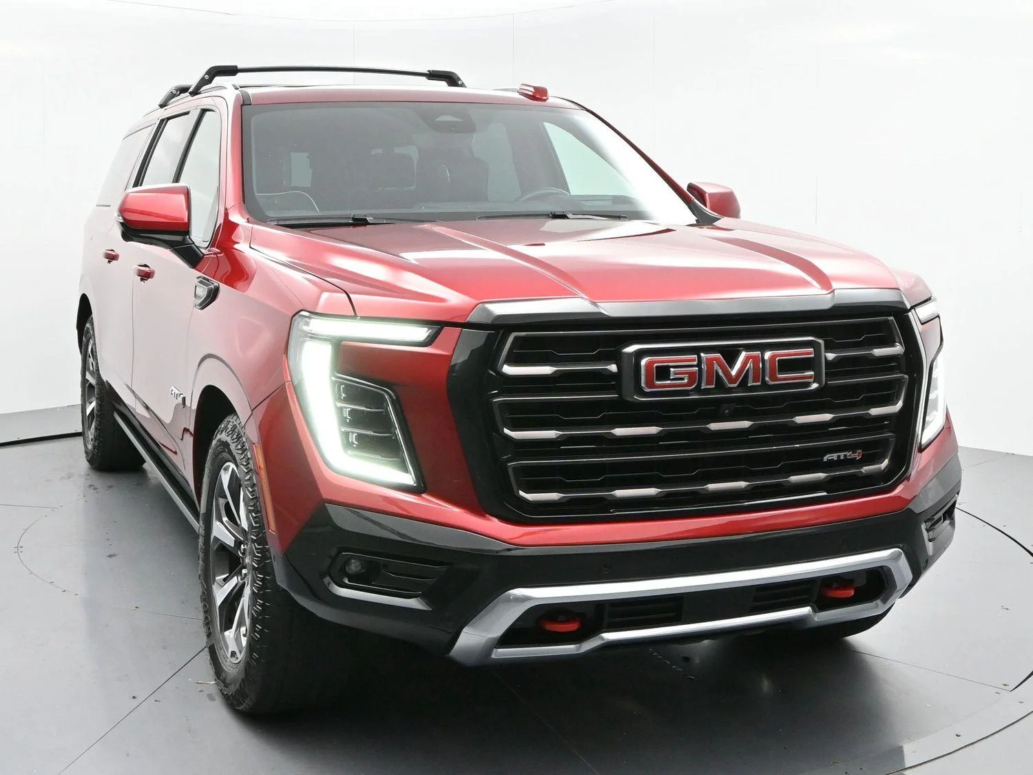 Used 2025 Volcanic Red Tintcoat GMC AT4 Ultimate image 2