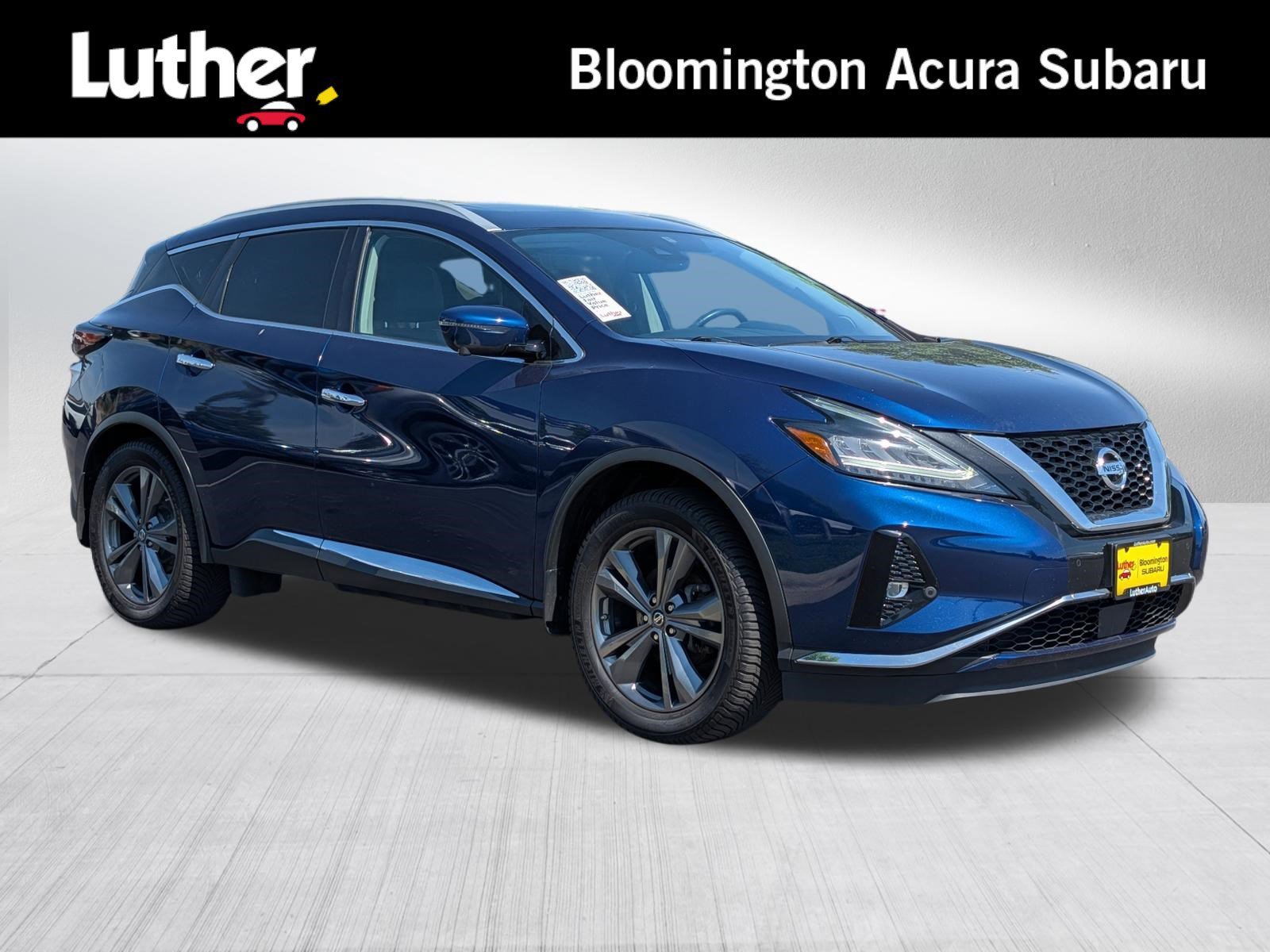 Used 2019 Deep Blue Pearl Nissan Platinum image 1