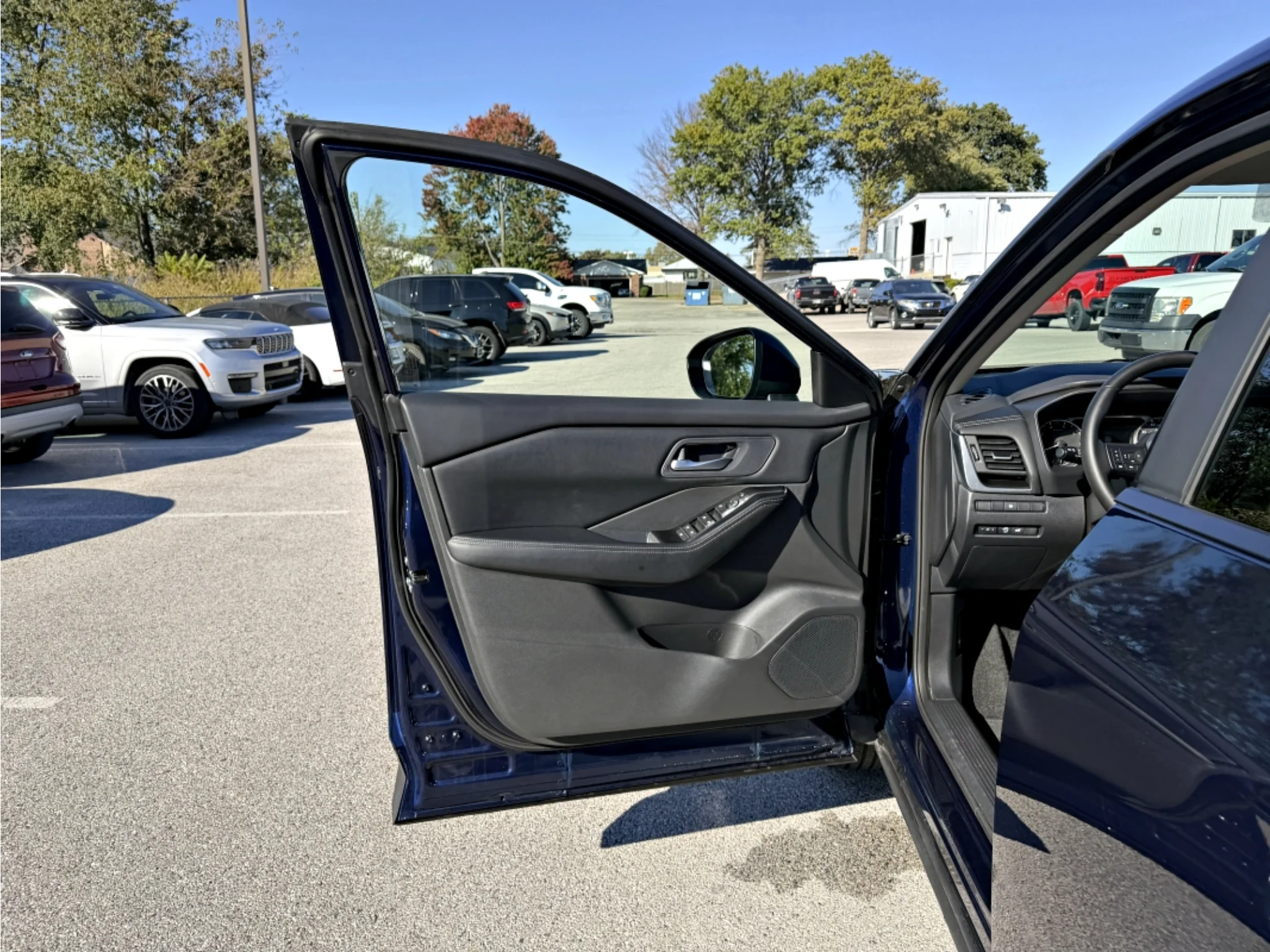 Used 2026 Deep Ocean Blue Pearl Nissan SV image 11