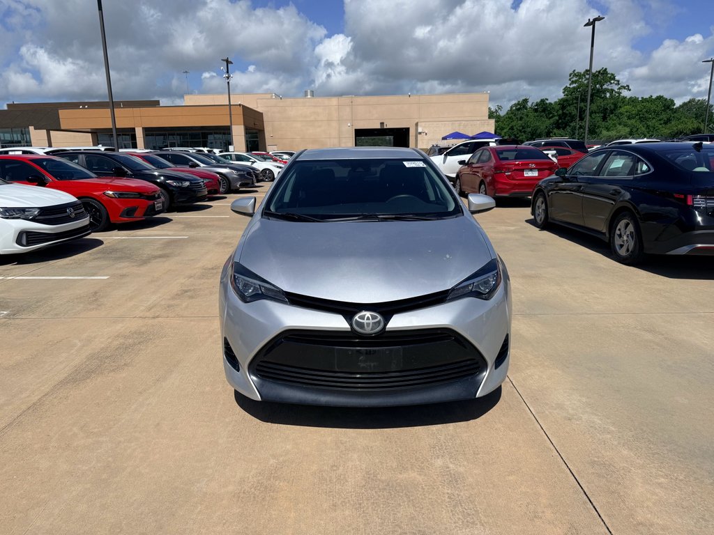 Used 2018 Classic Silver Metallic Toyota LE image 2