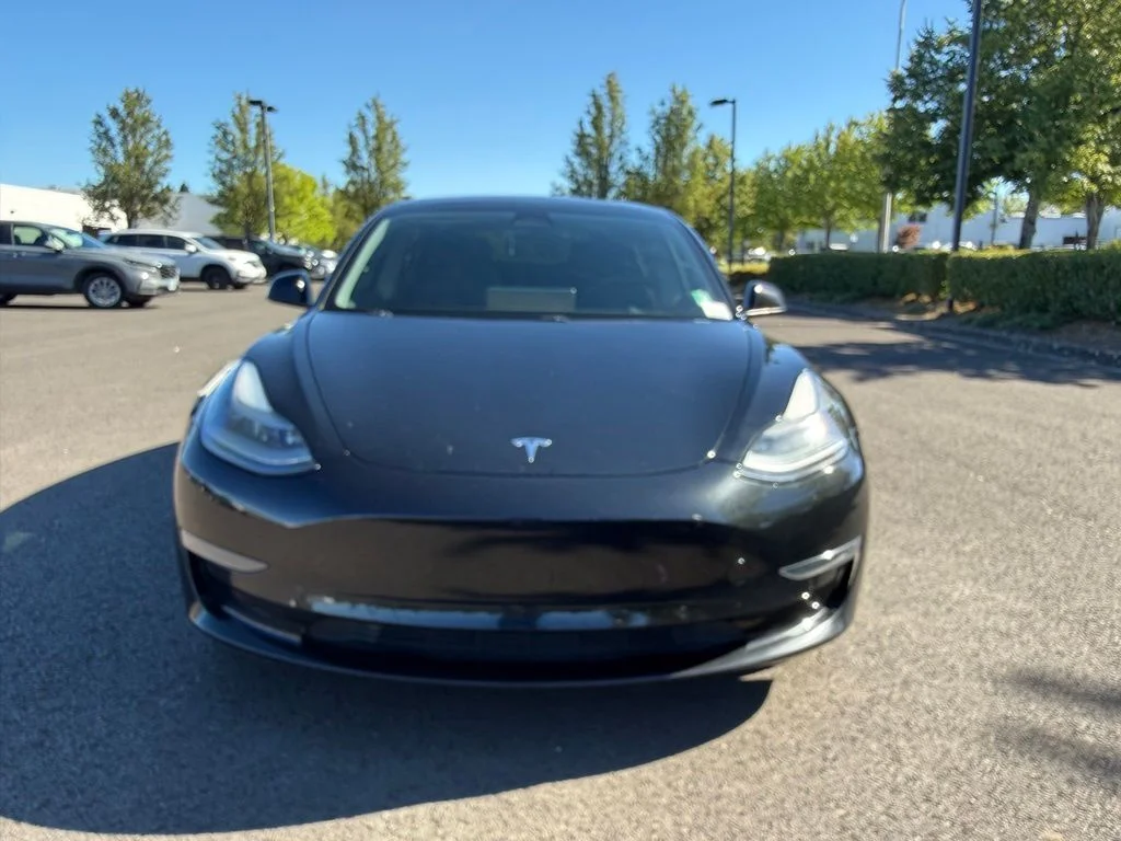 Used 2021 Solid Black Tesla Standard Range Plus image 2
