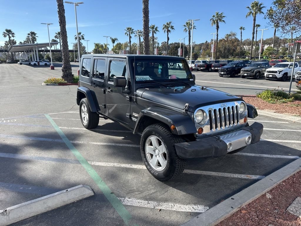 Used 2010 Jeep Wrangler Unlimited Sahara with VIN 1J4HA5H14AL122879 for sale in Chula Vista, CA