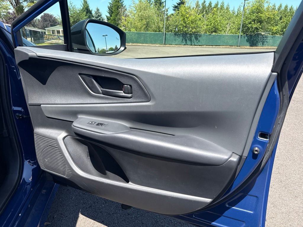Used 2025 Reservoir Blue Toyota LE image 25