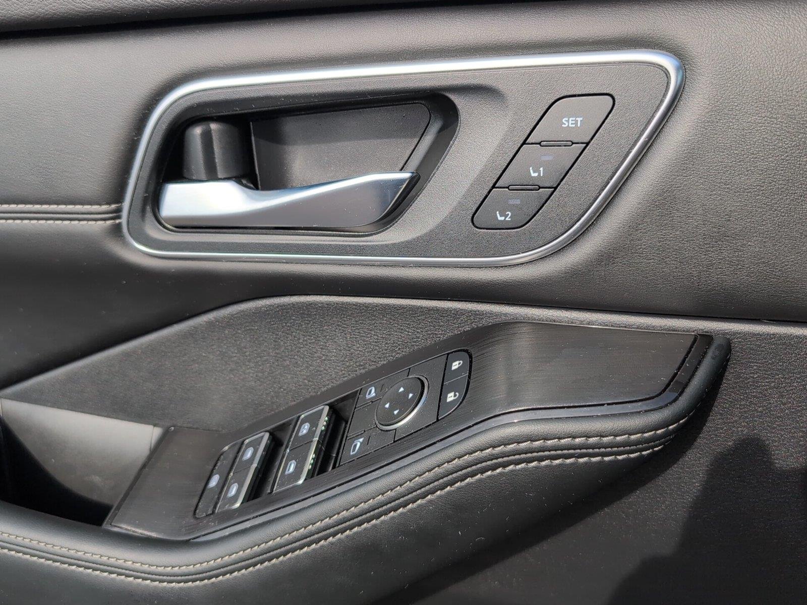 Used 2026 Super Black Nissan Platinum image 14