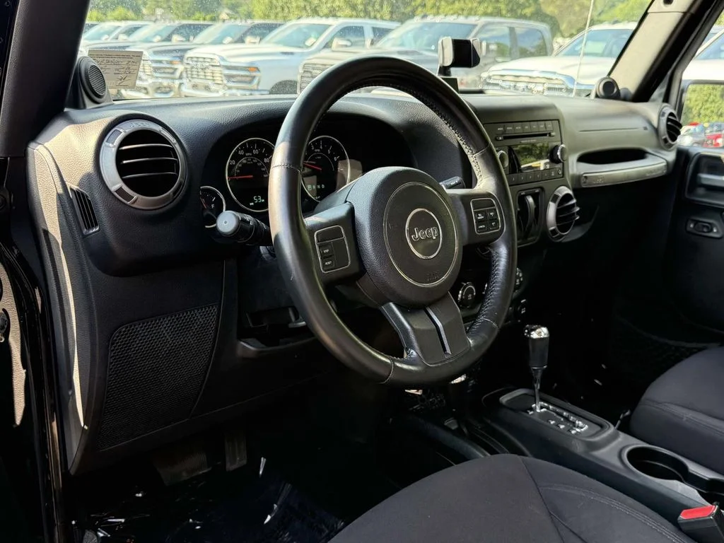 Used 2014 Black Jeep Sport image 2