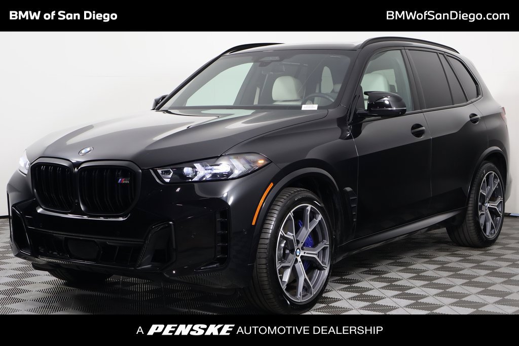 Certified Used 2024 Black Sapphire Metallic BMW M60i image 1