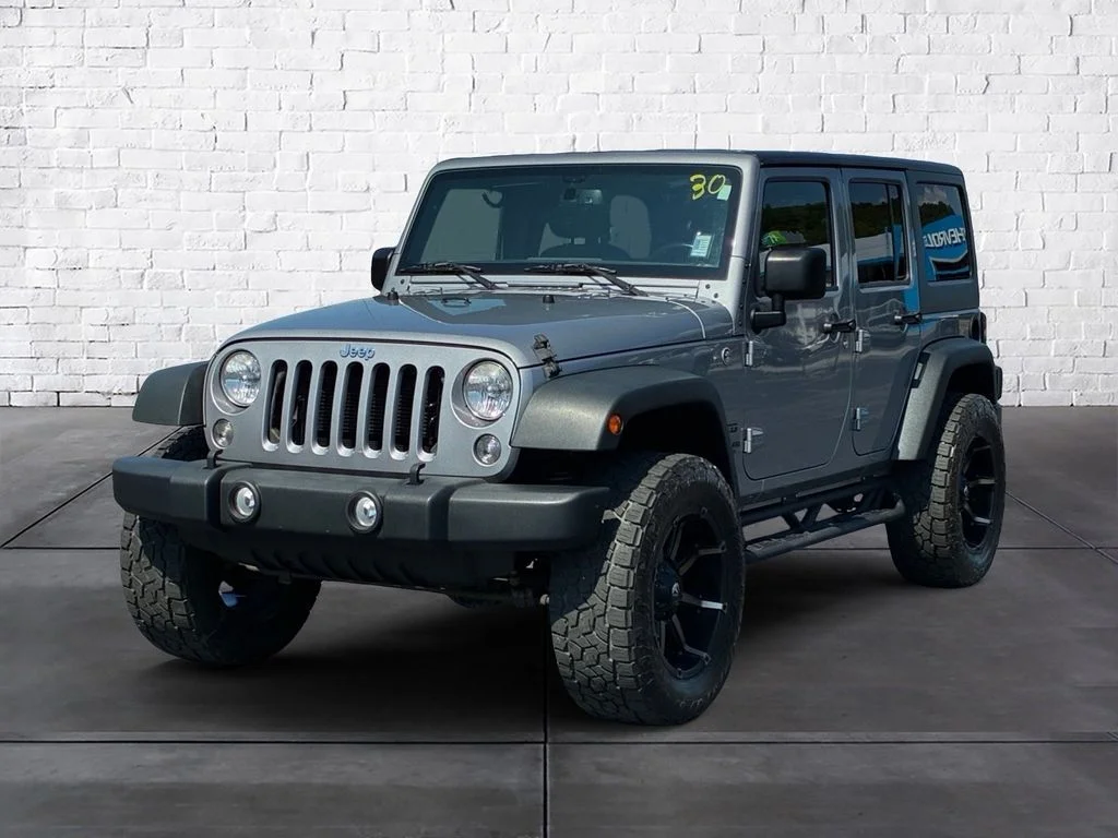 Used 2015 Silver Jeep Unlimited Sport image 2