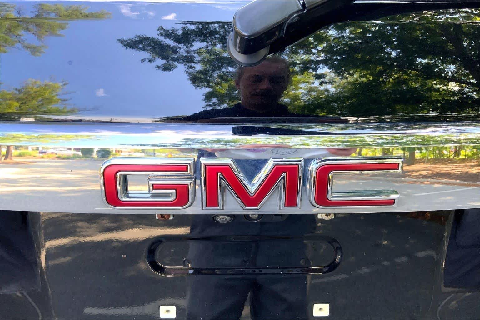 Used 2023 Ebony Twilight Metallic GMC Denali image 30