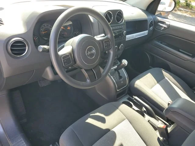 Used 2014 Granite Crystal Jeep Sport image 6