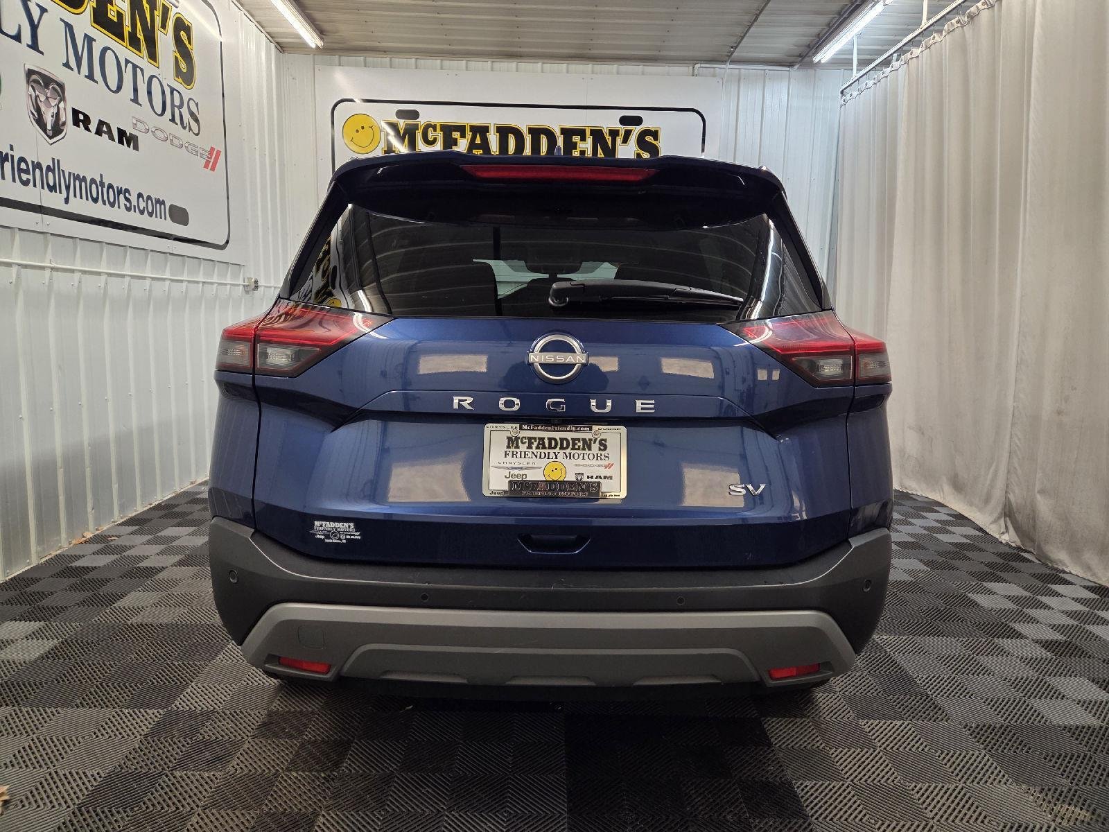 Used 2023 Caspian Blue Metallic Nissan SV image 7