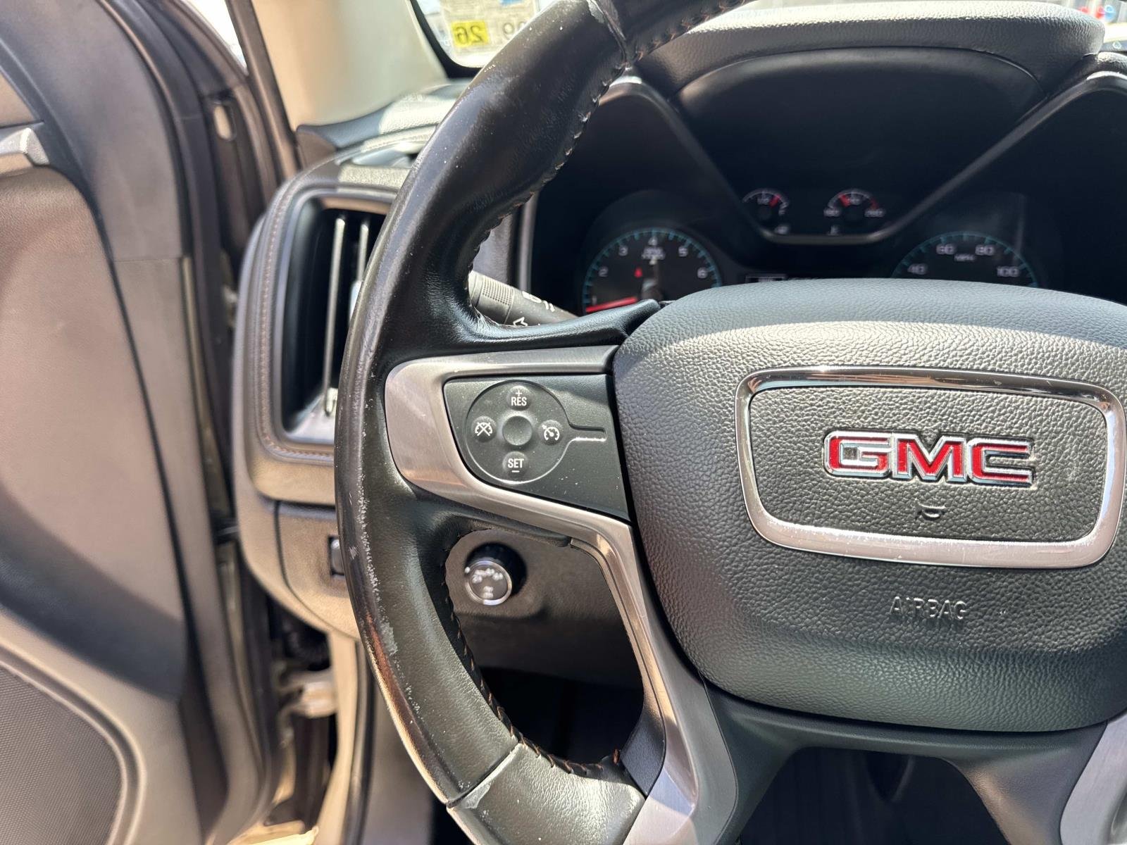 Used 2022 Desert Sand Metallic GMC 4WD AT4 w/Cloth image 22