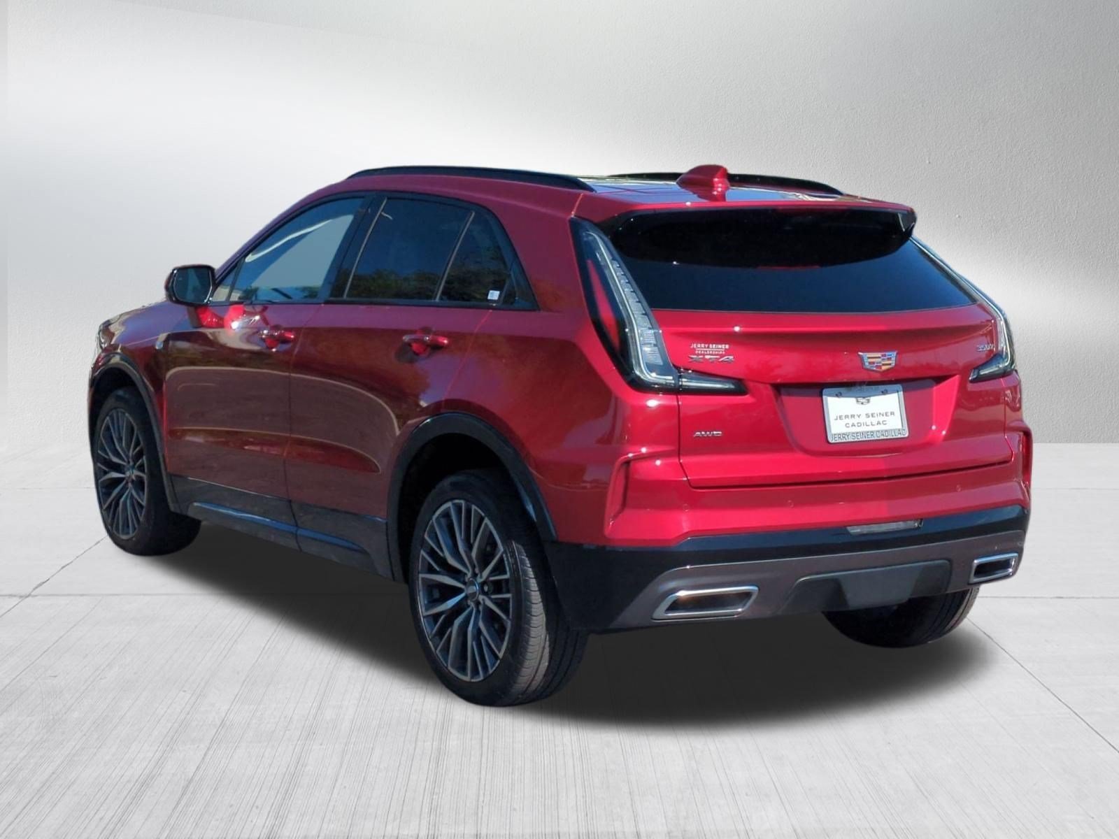 Used 2024 Radiant Red Tintcoat Cadillac Sport image 3