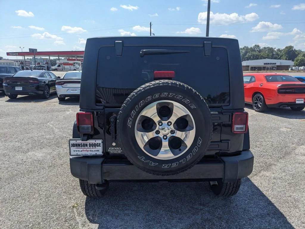 Used 2017 black Jeep 4d Convertible Sahara image 4