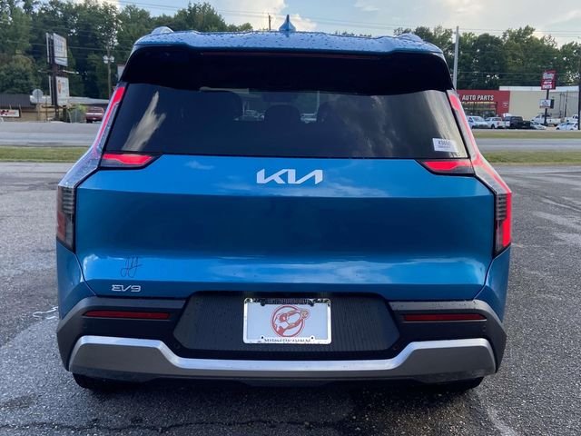 New 2026 Ocean Blue Kia Wind AWD image 3