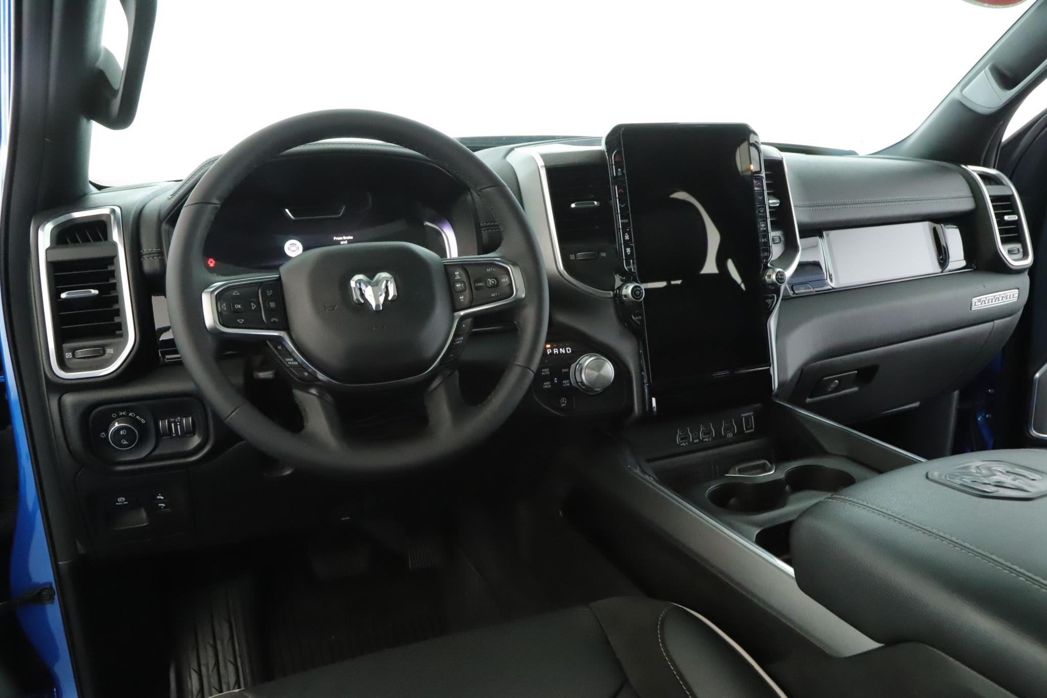 Used 2025 Hydro Blue Pearlcoat Ram Laramie 4x4 Crew Cab 5