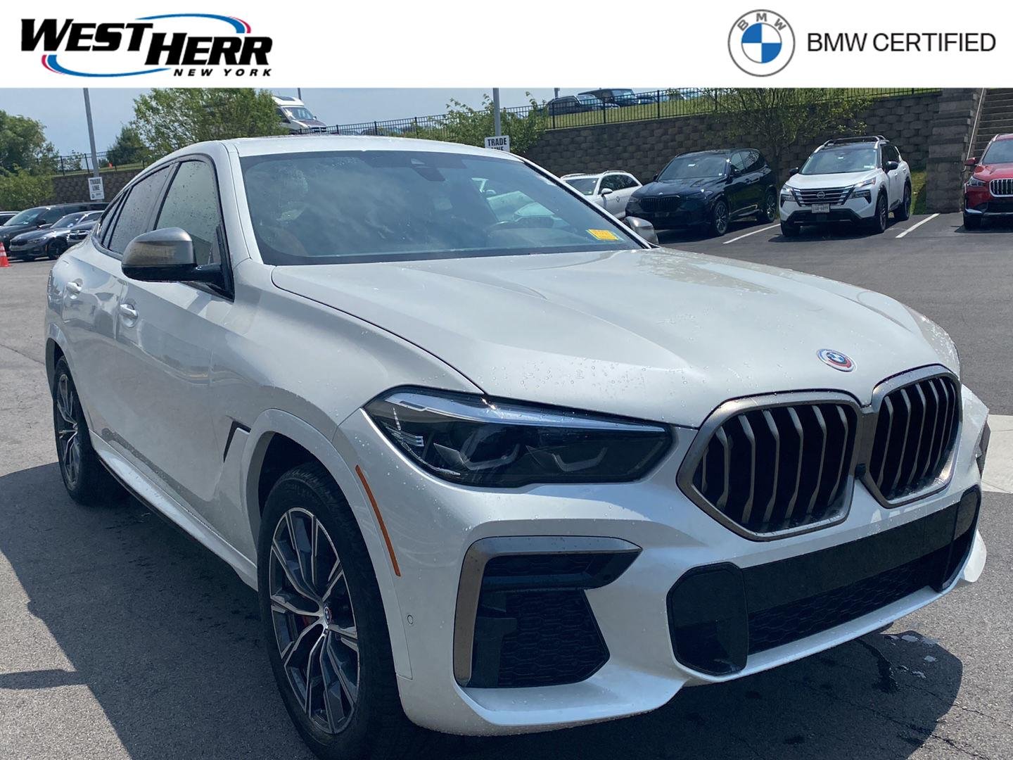 Certified Used 2023 Mineral White Metallic BMW M50i image 1