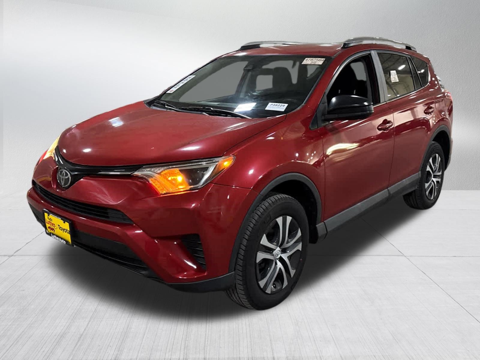 Certified Used 2017 Barcelona Red Metallic Toyota LE image 3