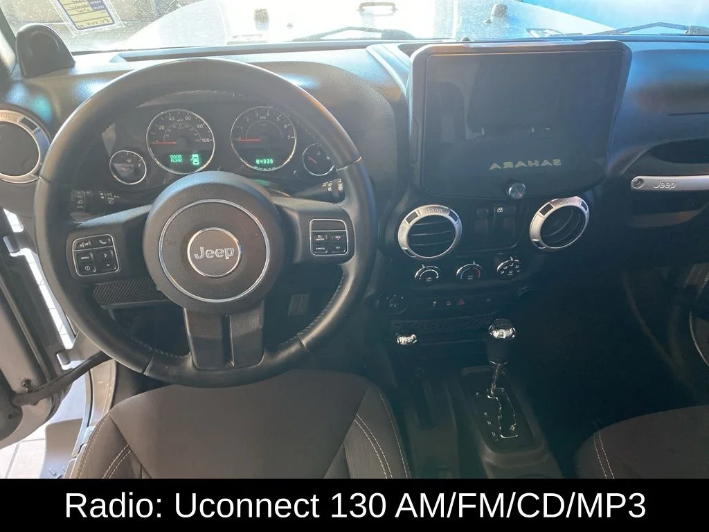 Used 2013 Silver Jeep Sahara image 5