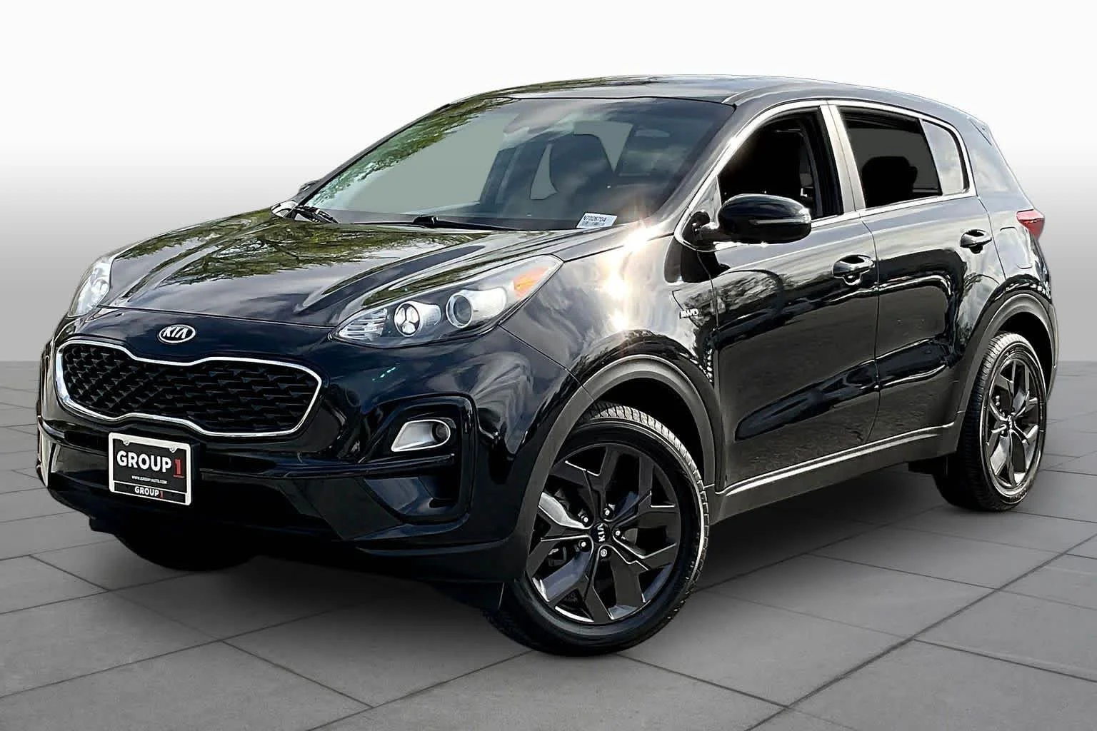 Used 2022 Black Cherry Kia LX image 2
