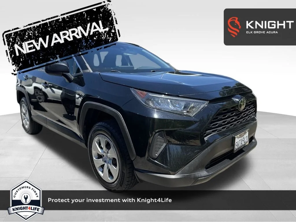 Used 2021 Midnight Black Metallic Toyota LE image 1