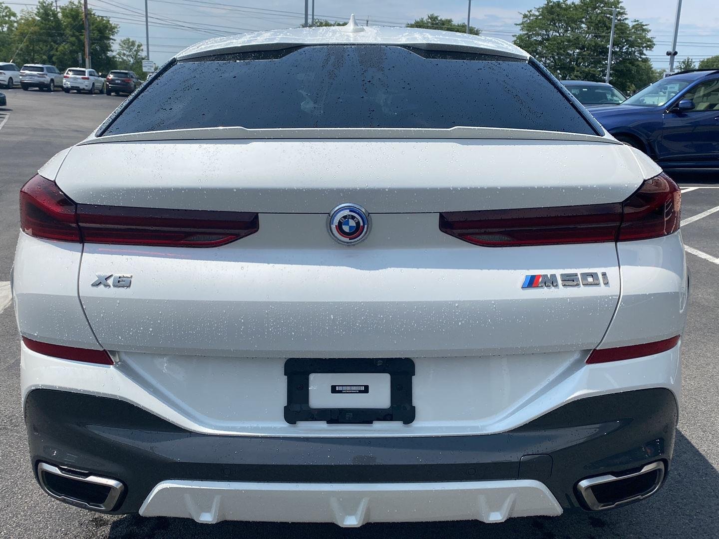 Certified Used 2023 Mineral White Metallic BMW M50i image 3