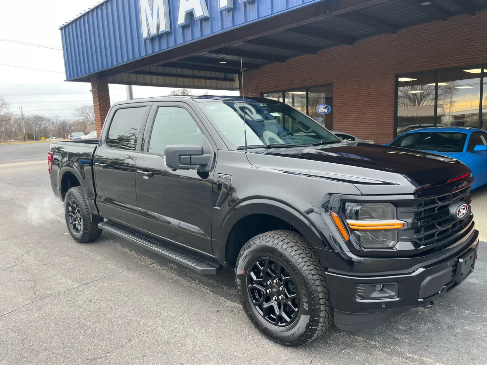 New 2026 Agate Black Metallic Ford XLT image 2