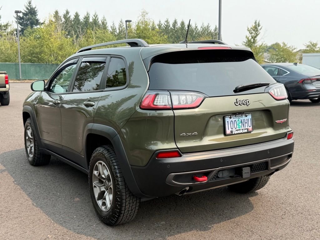 Used 2021 Olive Green Pearlcoat Jeep Trailhawk image 6