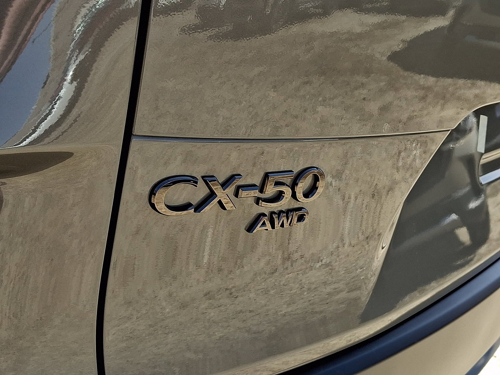 New 2026 Zircon Sand Metallic Mazda 2.5 Turbo Meridian Edition AWD image 13