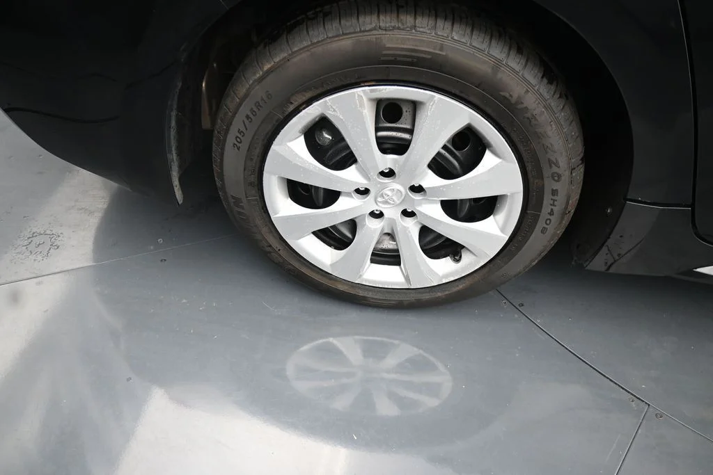 Used 2024 Black Toyota LE image 9