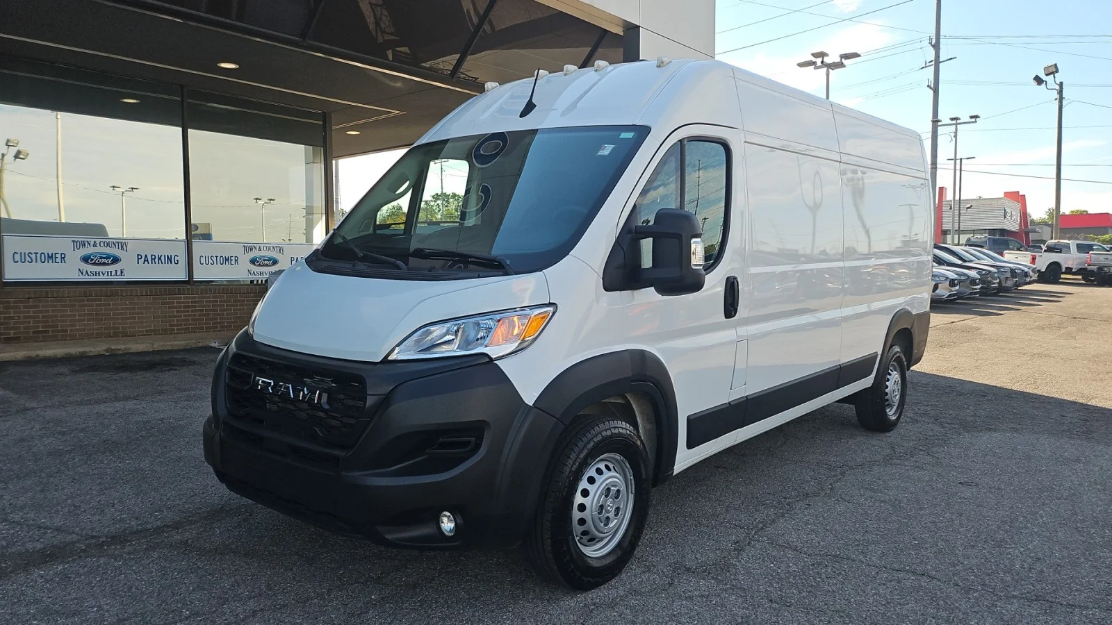 Used 2025 Bright Silver Clearcoat Metallic Ram Tradesman HR image 1