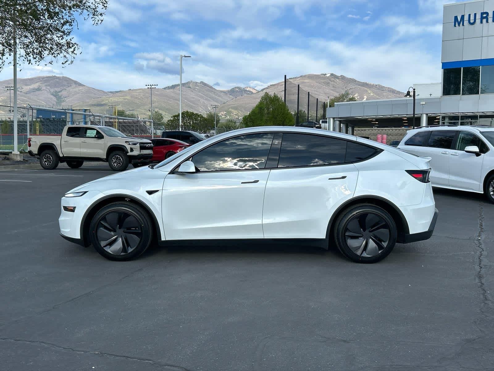 Used 2026 Tesla Model Y Long Range Launch Series with VIN 7SAYGDEE9TF346521 for sale in Woods Cross, UT