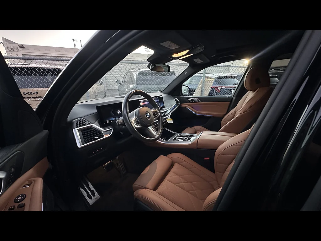 Used 2024 Black Sapphire Metallic BMW sDrive40i image 4