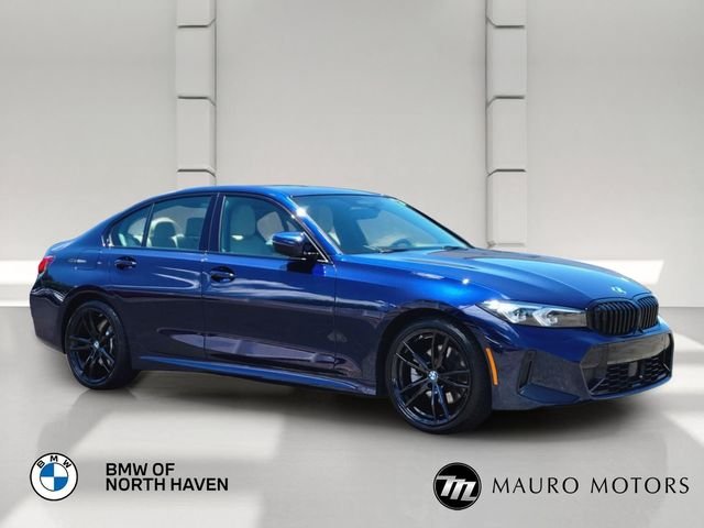 Used 2023 Blue BMW 330i xDrive image 1