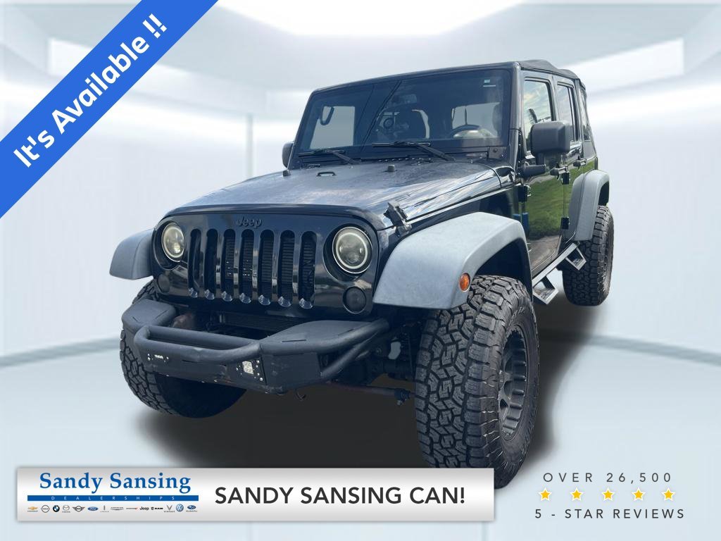 Used 2018 Black Jeep Unlimited Sport image 1