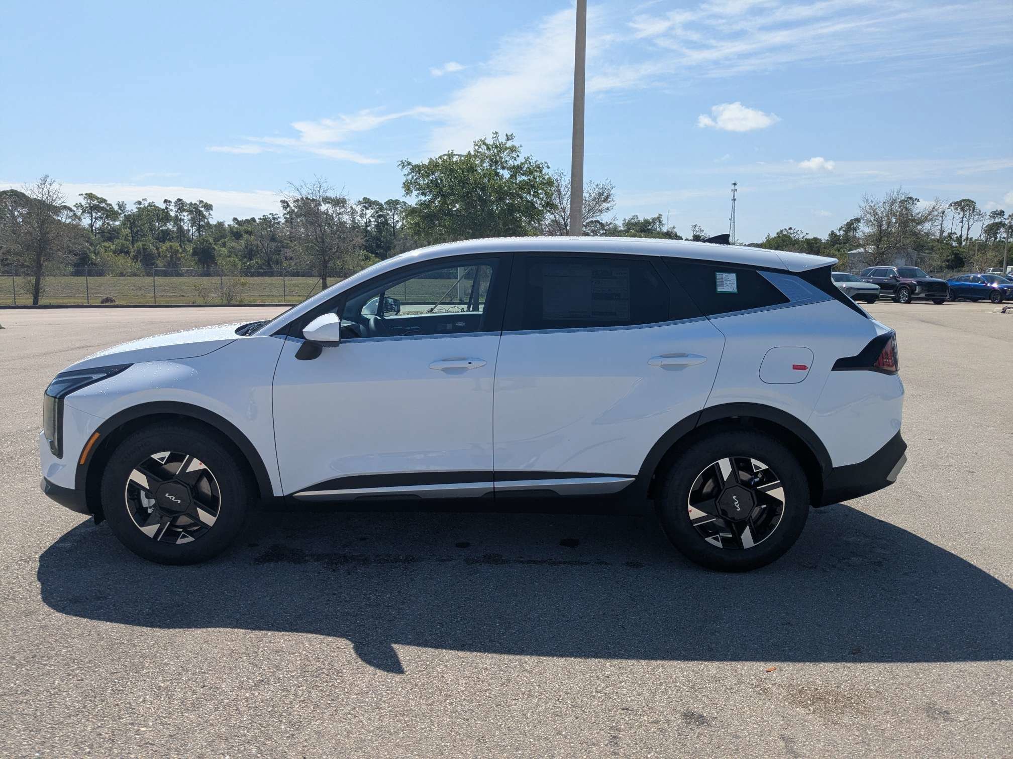 New 2026 Glacial White Pearl Kia LX image 8