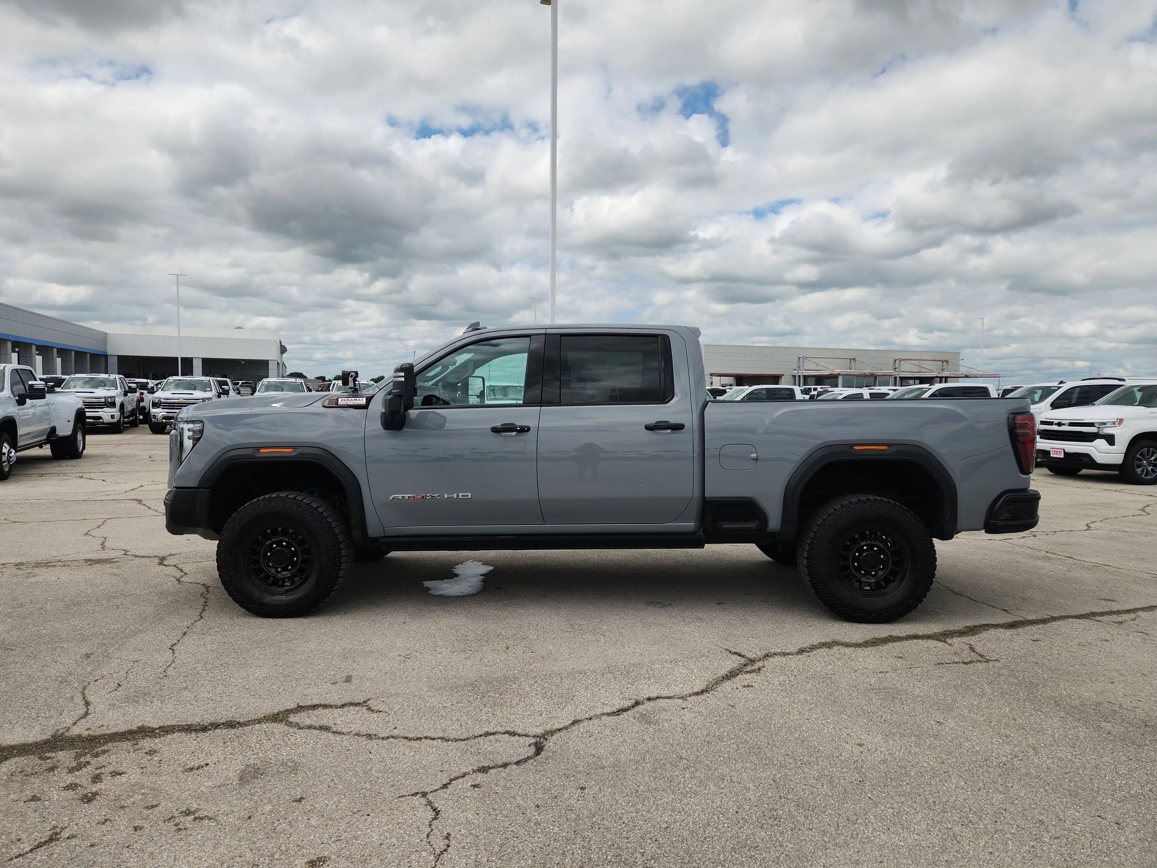 Used 2024 Thunderstorm Gray GMC AT4X AEV EDITION image 4