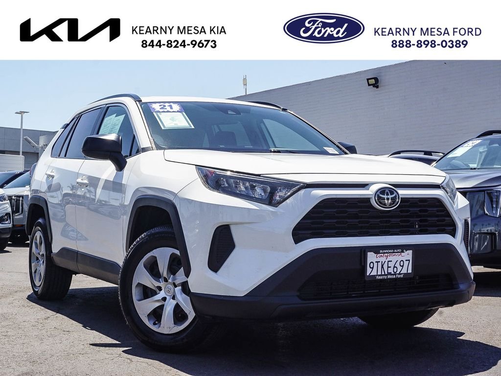 Used 2021 White Toyota LE image 1